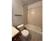 Simple bathroom with a bathtub and toilet at 2604 S Dunkirk Ct, Aurora, CO 80013