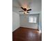 Well-lit bedroom featuring wood-look floors at 2604 S Dunkirk Ct, Aurora, CO 80013