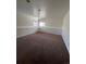 Finished basement with carpeted floors at 2604 S Dunkirk Ct, Aurora, CO 80013