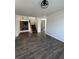 Spacious living room featuring hardwood floors and a staircase at 2604 S Dunkirk Ct, Aurora, CO 80013
