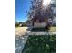House exterior with landscaping and a tree at 2604 S Dunkirk Ct, Aurora, CO 80013