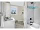 Clean bathroom with double vanity and a shower/tub combo at 1490 Saint Andrews Dr, Broomfield, CO 80020