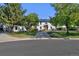 Two story home with circular driveway and landscaping at 1490 Saint Andrews Dr, Broomfield, CO 80020