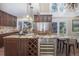 Gourmet kitchen with large island, stainless steel appliances, and granite countertops at 1490 Saint Andrews Dr, Broomfield, CO 80020