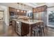 Modern kitchen with large island, stainless steel appliances, and granite countertops at 1490 Saint Andrews Dr, Broomfield, CO 80020