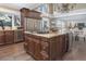 Spacious kitchen with large island, wine cooler, and stainless steel appliances at 1490 Saint Andrews Dr, Broomfield, CO 80020