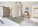 Bright main bedroom with sliding barn door and walk-in closet at 1490 Saint Andrews Dr, Broomfield, CO 80020