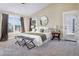 Spacious main bedroom with large windows and plush carpeting at 1490 Saint Andrews Dr, Broomfield, CO 80020