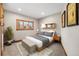 Charming bedroom with a queen bed and wood floors at 19 South Rd, Breckenridge, CO 80424