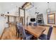 Open concept dining room with hardwood floors and a wood table at 19 South Rd, Breckenridge, CO 80424