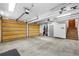 Two-car garage with ample storage space and stairs to upper level at 19 South Rd, Breckenridge, CO 80424