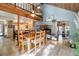 Open dining room with stone fireplace and loft at 1415 Golden Gate Dr, Golden, CO 80403