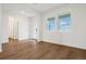 Bright and spacious entryway with light wood flooring and modern doors at 42980 Colonial Trl, Elizabeth, CO 80107