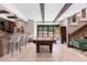 Basement recreation area with pool table and bar at 11164 Beatrice Ct, Littleton, CO 80125