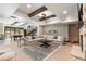 Open concept basement with Gathering room and game area at 11164 Beatrice Ct, Littleton, CO 80125