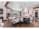 Modern kitchen with large island, granite countertops, and stainless steel appliances at 11164 Beatrice Ct, Littleton, CO 80125