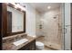 Bathroom with walk-in shower and modern vanity at 11164 Beatrice Ct, Littleton, CO 80125