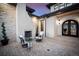 Brick paved patio with fireplace and comfortable seating area at 11164 Beatrice Ct, Littleton, CO 80125