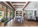 Bright dining area with hardwood floors and access to the backyard at 11164 Beatrice Ct, Littleton, CO 80125