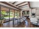 Kitchen dining area with hardwood floors, sliding doors, and access to the backyard at 11164 Beatrice Ct, Littleton, CO 80125