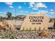Coyote Creek Golf Course entrance sign and parking lot at 2164 Alyssa St, Fort Lupton, CO 80621