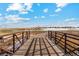 Wooden footbridge over a tranquil waterway at 2164 Alyssa St, Fort Lupton, CO 80621