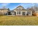 House backyard with gazebo, patio, and grassy area at 6102 S Cody Way, Littleton, CO 80123