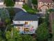 Aerial view of house, highlighting its size and backyard deck at 10799 Eagle Crest Ct, Parker, CO 80138