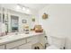 Clean bathroom with updated vanity and fixtures at 4468 Driftwood Pl, Boulder, CO 80301