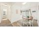 Bright dining room with access to bathroom and kitchen at 4468 Driftwood Pl, Boulder, CO 80301