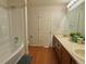 Main bathroom with double sinks and a bathtub at 8135 Eagleview Dr, Littleton, CO 80125