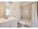 Clean bathroom with a tub, shower, and white vanity at 2604 S Xanadu Way # B, Aurora, CO 80014