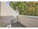 Private balcony with treetop views and small table at 2604 S Xanadu Way # B, Aurora, CO 80014