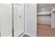 Modern bathroom with a walk-in shower and access to the large walk-in closet at 5758 Ranch St, Mead, CO 80504