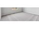 Unfurnished bedroom with plush carpeting and a window offering natural light at 5758 Ranch St, Mead, CO 80504