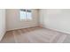 Empty bedroom with neutral walls and carpeting at 5758 Ranch St, Mead, CO 80504
