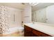 Clean bathroom with tub shower, toilet and vanity at 13961 E Marina Dr # 106, Aurora, CO 80014