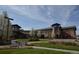 Community clubhouse with landscaping and walkways at 13961 E Marina Dr # 106, Aurora, CO 80014