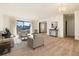 Spacious living area with lots of natural light and access to a balcony at 13961 E Marina Dr # 106, Aurora, CO 80014