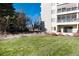 Ground level patio with grassy area and building view at 13961 E Marina Dr # 106, Aurora, CO 80014