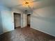 Bedroom with double door closet and neutral walls at 16619 E Prairie Wind Ave, Parker, CO 80134