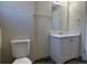 Bathroom with vanity, toilet and mirror at 3875 E 123Rd Ave, Thornton, CO 80241