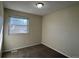 Simple bedroom with a window and carpet at 3875 E 123Rd Ave, Thornton, CO 80241