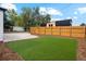 Backyard with artificial turf and wood fence at 4643 S Cherokee St, Englewood, CO 80110
