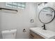 Modern bathroom with updated vanity, toilet and fixtures at 4643 S Cherokee St, Englewood, CO 80110