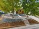 Attractive curb appeal with landscaping and stone pathway at 4643 S Cherokee St, Englewood, CO 80110