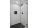 Clean shower with marble tile and glass enclosure at 4643 S Cherokee St, Englewood, CO 80110