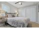 Cozy bedroom with a comfortable bed and ensuite bathroom at 4643 S Cherokee St, Englewood, CO 80110