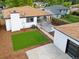 Artificial turf, patio, and detached garage at 4643 S Cherokee St, Englewood, CO 80110