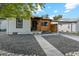 Modern craftsman style home with a carport and landscaped yard at 4643 S Cherokee St, Englewood, CO 80110